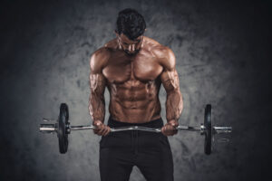 A man in great physical shape lifting weights